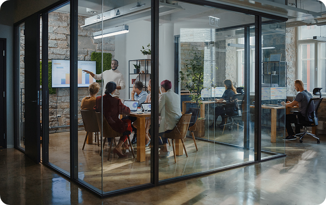 Conference room with employees during a presentation