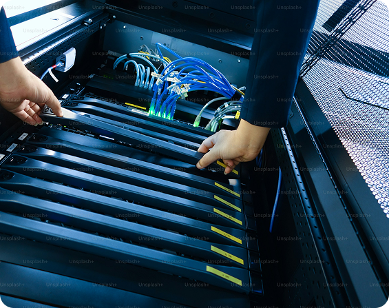 IT Professional working on a server rack