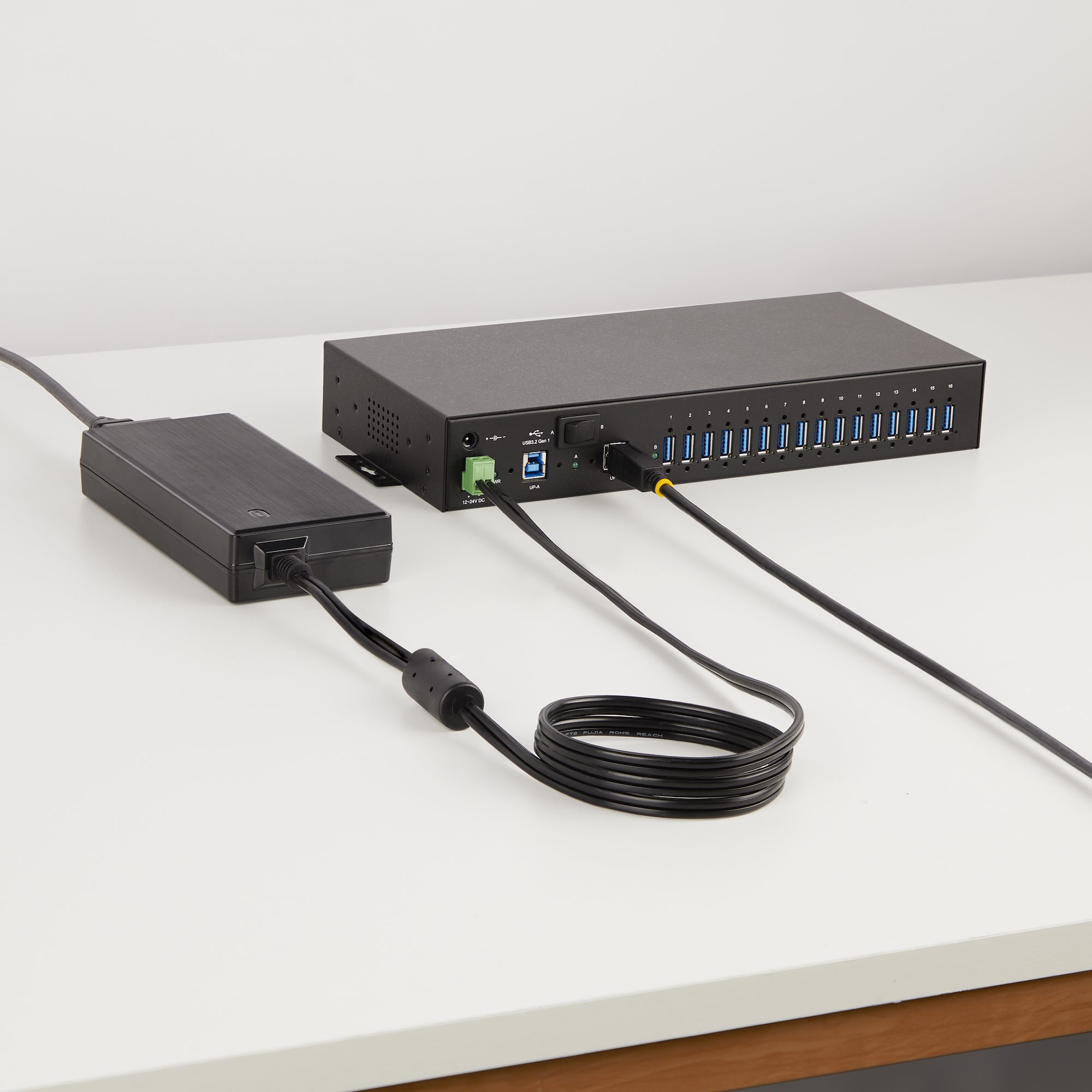 Add 16x USB 3.2 Gen 1 (5 Gbps) ports to two host computers, using