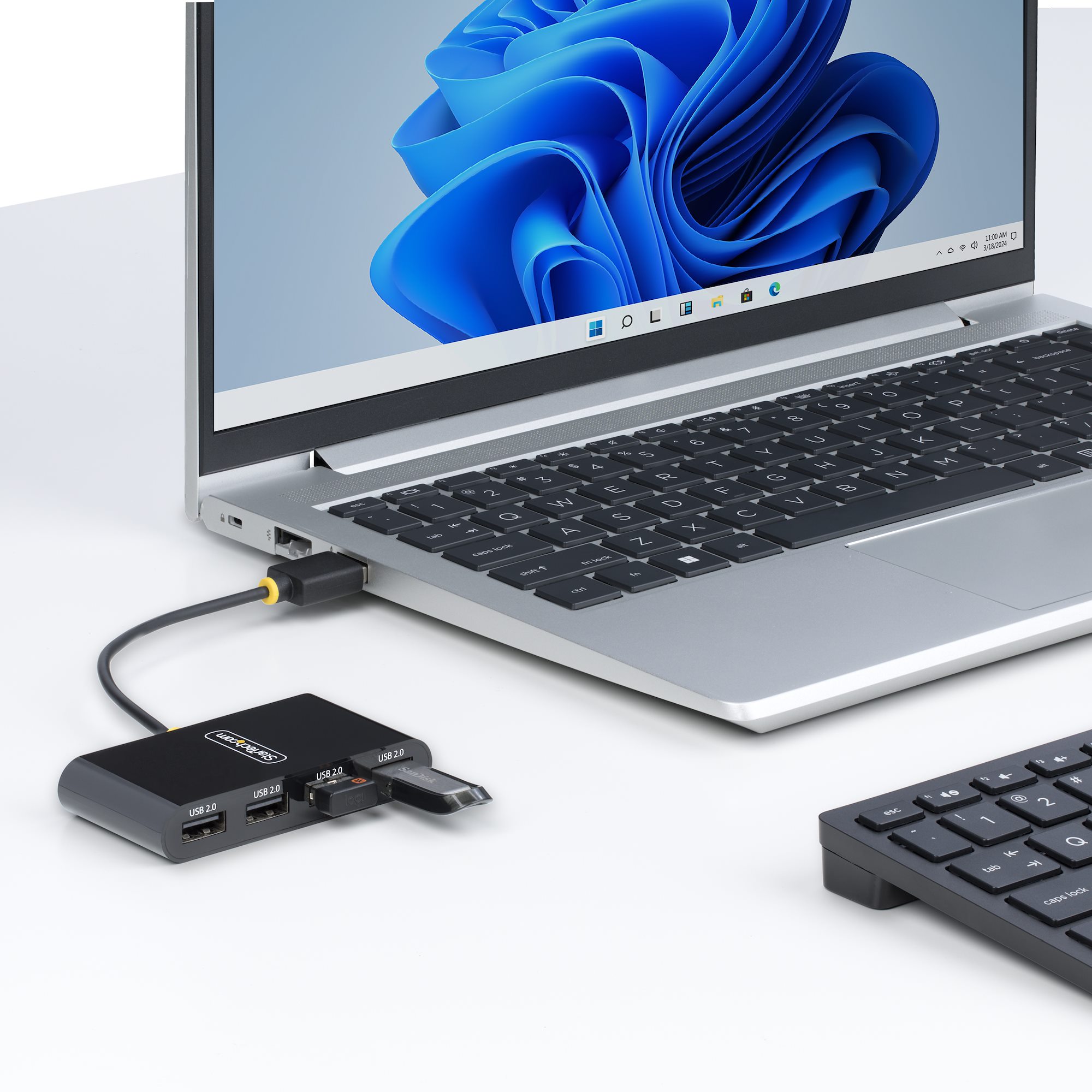 Add four USB 2.0 Type-A ports to your computer, using this compact